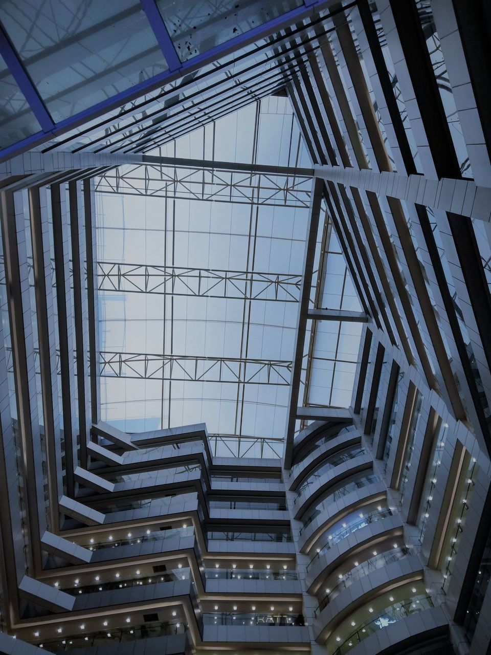 LOW ANGLE VIEW OF STAIRCASE IN BUILDING