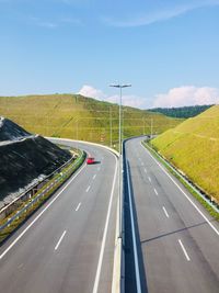 Vehicle on road against sky