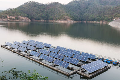 Scenic view of lake and solar panels 