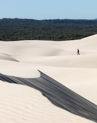 Scenic view of desert against clear sky