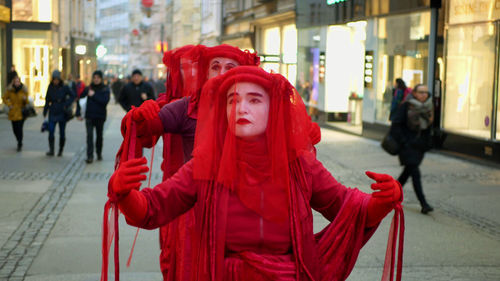 Women standing on street in city