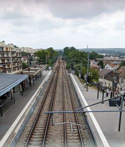 Railroad tracks against sky