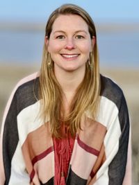 Portrait of smiling young woman at chatham, cape cod. 