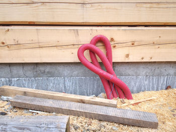 Close-up of rope tied on wood