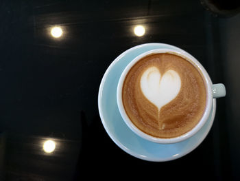 Close-up of coffee served on table