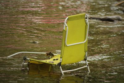 Abandoned lounge chair during flood