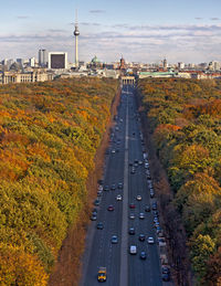 High angle view of road amidst plants in city