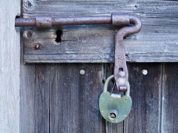 Close-up of padlock on door