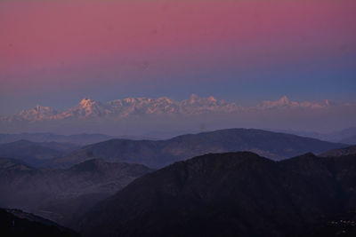 Scenic view of mountains against sky during sunset