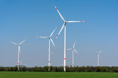 Wind turbines in an agricultural area seen in germany