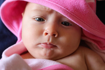 Close-up portrait of girl with towel