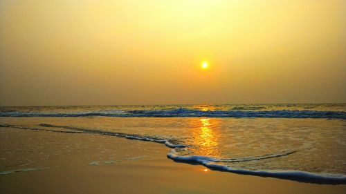 Scenic view of sea at sunset