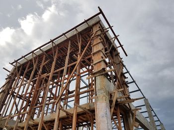 Low angle view of construction site against sky