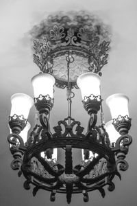 Low angle view of illuminated chandelier