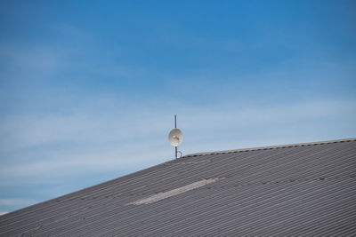 Low angle view of building against clear blue sky