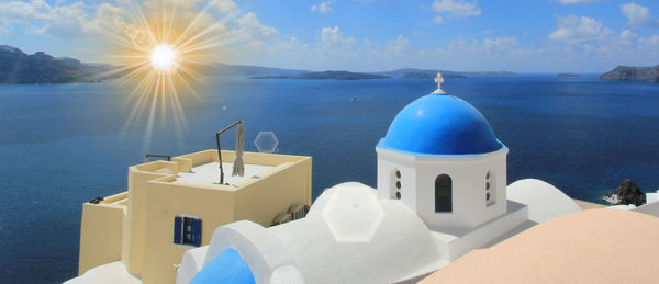 Panoramic view of sea and building against sky