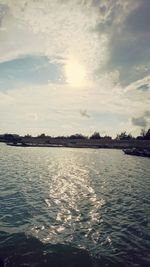 Scenic view of sea against sky at sunset