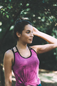 Portrait of beautiful young woman looking away