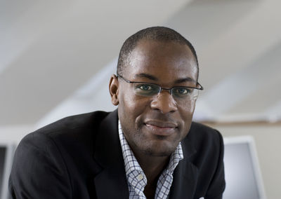 Portrait of smiling young man in office