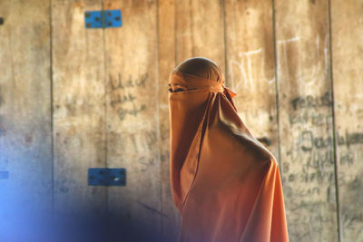 A muslim woman who wears a veil