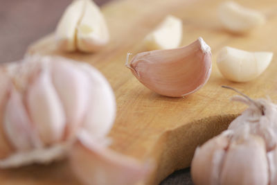 Close-up of garlic on cutting board