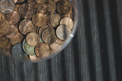 High angle view of coins on table