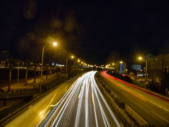 Light trails on road at night