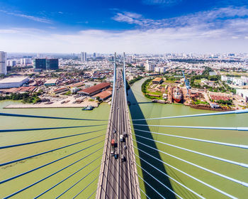 High angle view of phu my bridge over river in city against sky