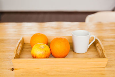 Close-up of orange fruits on table