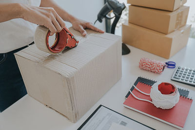 High angle view of woman working on table
