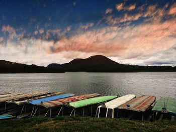 Scenic view of lake against sky during sunset