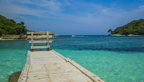Scenic view of sea against blue sky