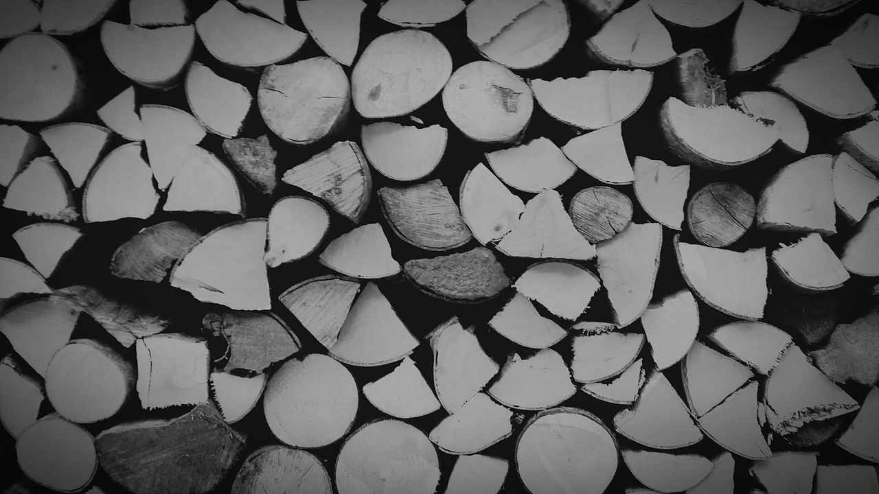 full frame, backgrounds, large group of objects, abundance, pattern, stack, repetition, textured, firewood, lumber industry, deforestation, wood - material, close-up, log, in a row, timber, high angle view, no people, arrangement, shape