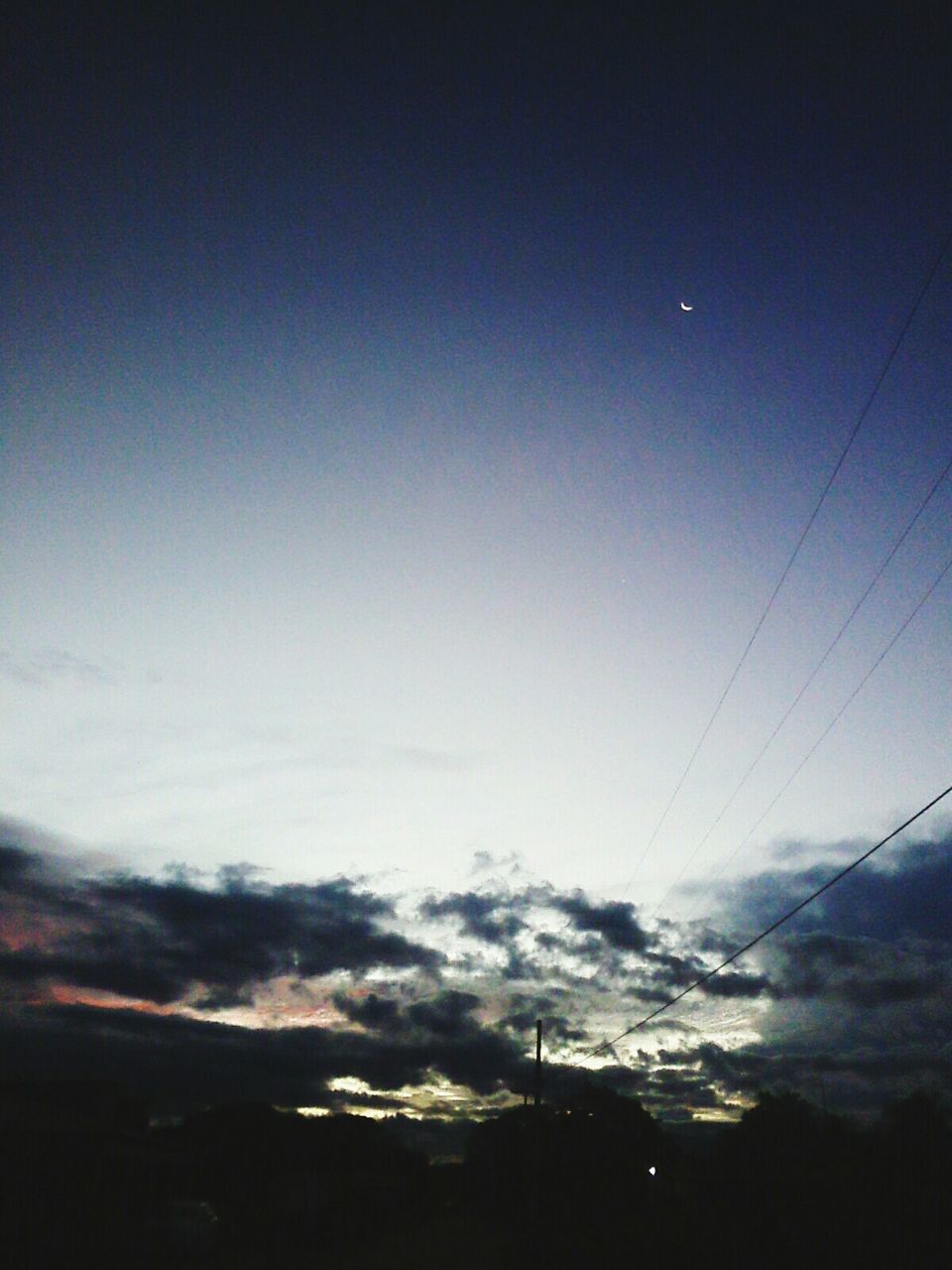 power line, low angle view, electricity, electricity pylon, sky, silhouette, power supply, connection, cable, technology, fuel and power generation, dusk, sunset, scenics, nature, beauty in nature, tranquility, tranquil scene, cloud - sky, outdoors