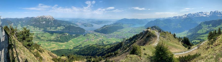 Panoramic shot of trees and mountains against sky