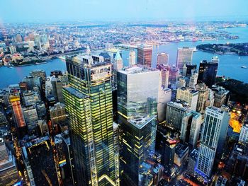 High angle view of modern buildings in city against sky