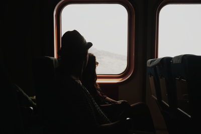 Man sitting in train