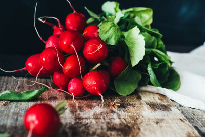 Radishes on wooden table