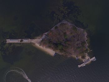 High angle view of cars on land against mountains