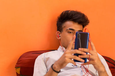 Young man using mobile phone