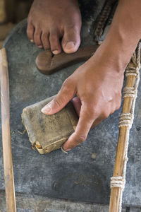 High angle view of man working at workshop