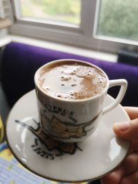 Coffee cup on table