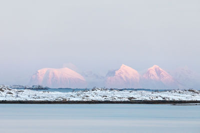 Scenic view of sea against sky during winter