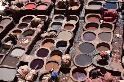 High angle view of people washing clothes outdoors