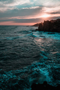 Scenic view of sea against sky during sunset