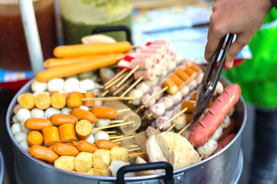 Close-up of person preparing food