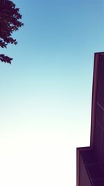 Low angle view of built structure against clear blue sky