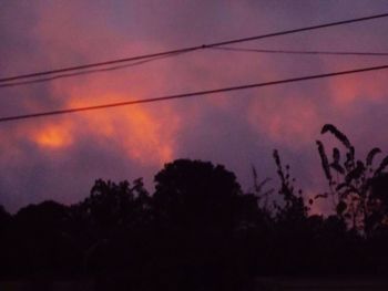 Low angle view of cloudy sky at dusk