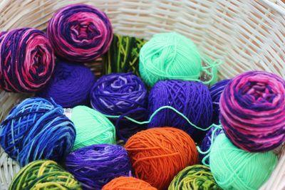 Close-up of colorful wools in basket