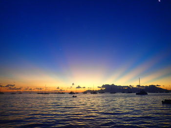 Scenic view of sea against sky at sunset